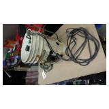 Submersible pump in bucket w/holes