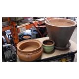 Clay pots various sizes, bamboo poles