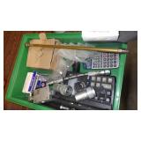 Calculators, bin dividers, brass spray gun,