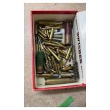 One 8 ga with  misc ammo and brass