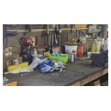 Tools and contents of lower wall and bench.  Vise