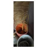 Extension cords, pry bars and buckets with