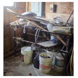 Shovels, metal bench and contents of corner