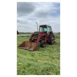 International 1586 with Westendorf loader. Runs