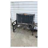 Wooden bench, solar lights and small metal table
