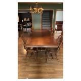 Dining room table and 6 chairs with 2 leafs