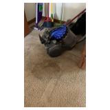 Dyson vacuum and contents of closet