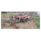 Small trailer with 'bush hog' unknown condition