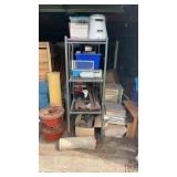Two metal racks with contents