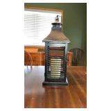 Metal lantern with battery operated candle