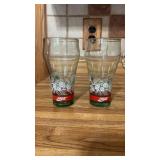 Two Coca Cola Christmas glasses