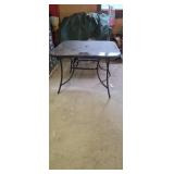 Patio table with glass top