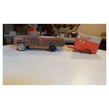 Pressed metal truck with U-Haul trailer