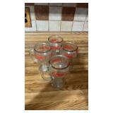 Four Pepsi cola glasses