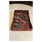 Toy cars in wooden box