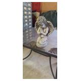 Stone praying angel