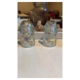 Two Hemingray 9 one hemingray 14 insulators and