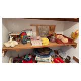 Contents of shelfï¿½s and clothes and  close