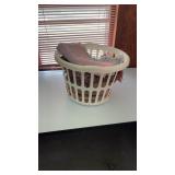 Laundry basket with small throw rugs