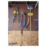 Contents of wall including grease gun. Grease gun