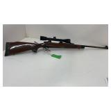 Remington 700 7mm with bushnell 4x banner scope.