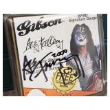 Autographed Ace Frehley Gibson Strings & Pick