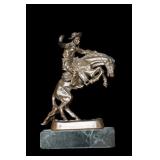 Remington 4 3/4' Buster Bronze.