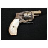 Pearl Handled Hammerless Folding Trigger Pistol.