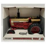 NIB ERTL International 1026 Gold Demonstrator Toy
