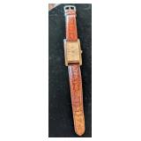 PEUGEOT QUARTZ WATCH, EMBOSSED LEATHER STRAP