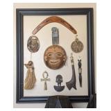 FRAMED ASSORTMENT OF GLOBAL CULTURAL ARTIFACTS