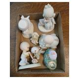7 precious moment figures.