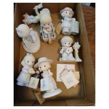 7 precious moment figures.