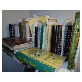 Vintage cookbooks in closet.