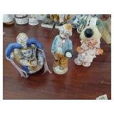 3 clown figures.