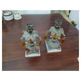 Candle holders with prisms