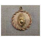 14 kt gold award pendant 1 1/4'  wide 9 grams