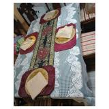 Table linens, metal plates runner more.