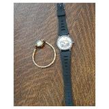 2 watches looney tunes and vintage bulova.