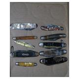8 assorted pocket knives some are rough