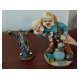 2 clown figures, 14 and 10 inches tall.