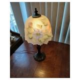 Reverse painted glass lamp, 17 inches tall.