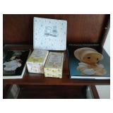 2 precious moments in box and 3 books.