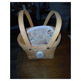 Precious moment basket with handles 13.5' tall.