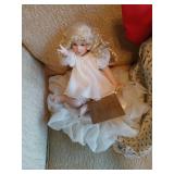 Angel kisses cute little doll