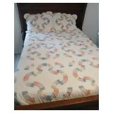 Vintage quilt and 2 matching pillow shams.