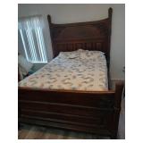 Antique full size bed matches dresser with