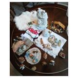 Box of Christmas items, faux bear skin rug.
