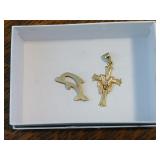 14 Kt gold cross and dolphin slide 3 grams total