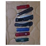 7 different pocket knives.
